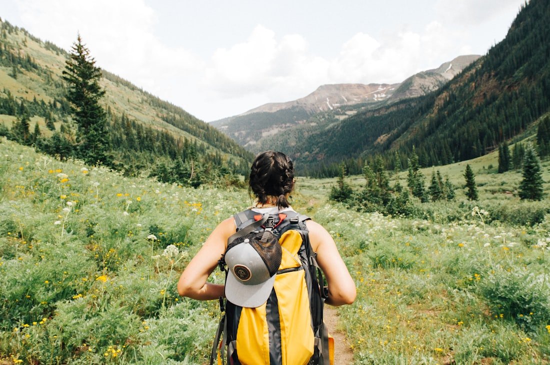 Hiking group member on a mountain trail