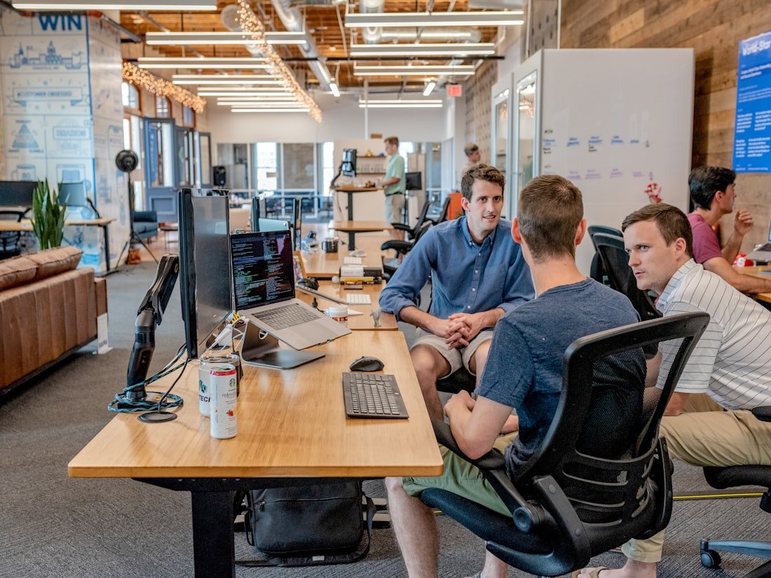 Business community members talking in an office